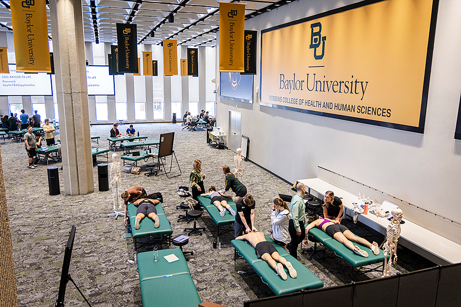Physical therapy lecture taking place during live immersion